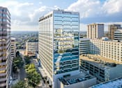 Thumbnail 1 of 19 - A Sammons building is seen from a high vantage point.