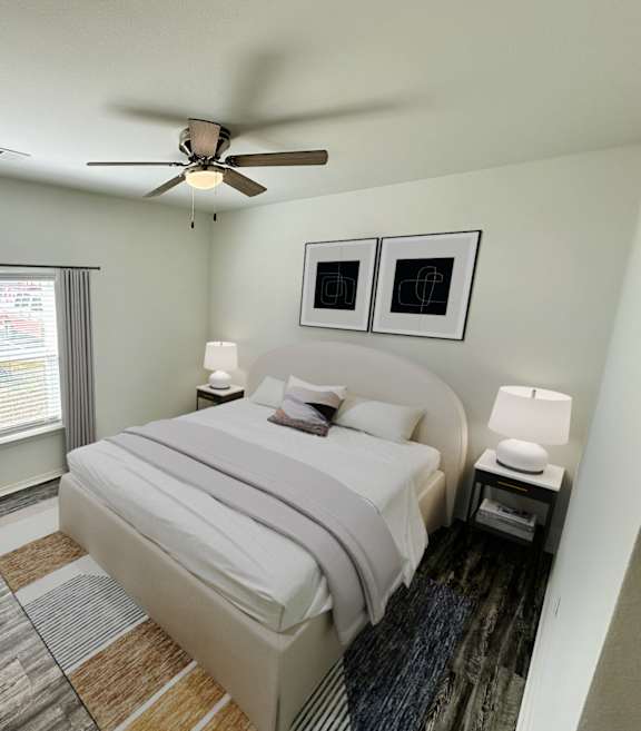 A bedroom with a bed, nightstand, and window.