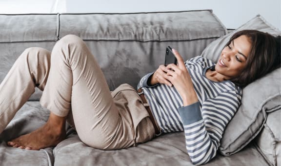 Woman relaxing on couch