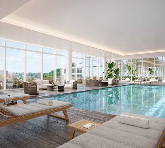 a swimming pool in a building with floor to ceiling windows at AVE Hamilton Green - 25 Cottage Apartments, White Plains ,New York, 10601