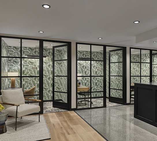 A room with a glass door and a wooden floor.