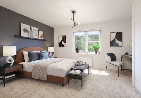 a bedroom with a bed and desk in a 555 waverly unit