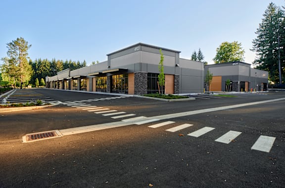 a large building with a street in front of it
