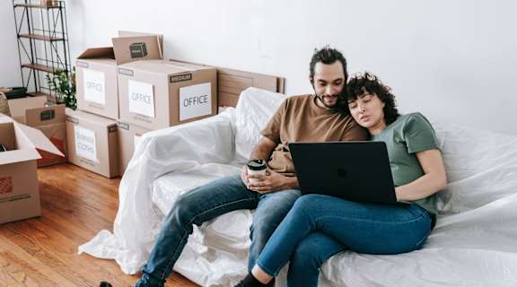 Couple hanging out in Lansing MI Apartment