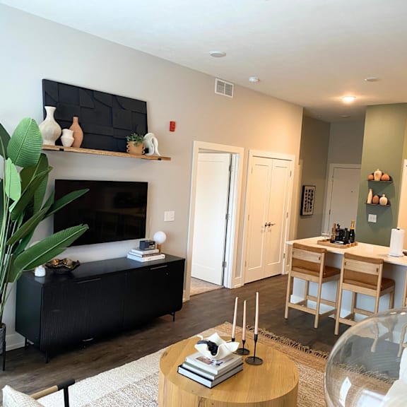 Living room at Newton Place Apartments in Haslett, MI