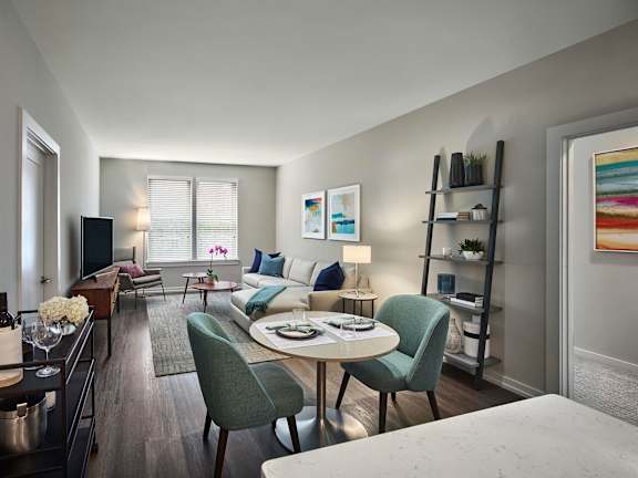 a living room with a couch and a coffee table at AVE King of Prussia