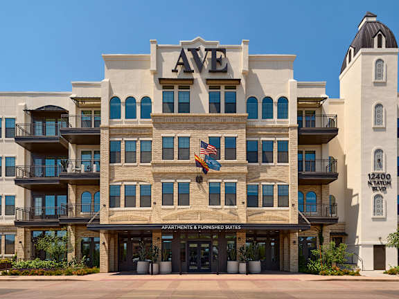 A large building with the words AVE on the top.