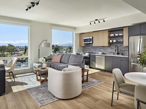 A modern living room with a view of the city.