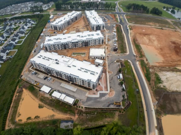 an aerial view of an apartment complex under construction in the city