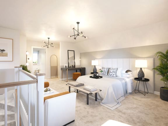 a bedroom with a bed and a nightstand with a lamp on it