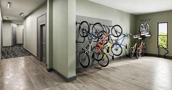 a row of bikes on a wall in a room at Link Apartments® CYKEL Apartments, Charlotte , NC