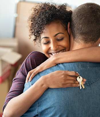 Dominium_Cathy's Pointe_Young Couple Moving Lifestyle Image_Main