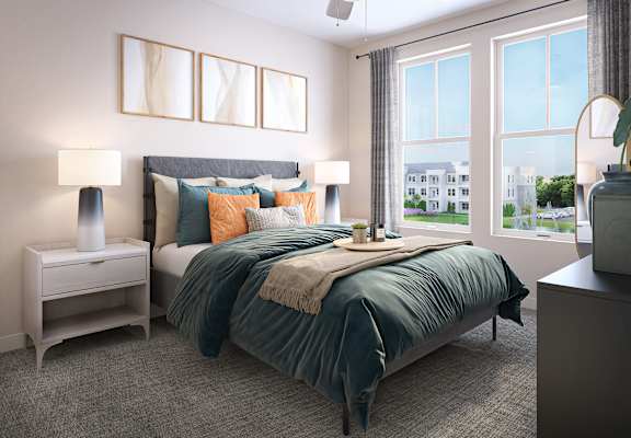 a bedroom with a large window and a bed