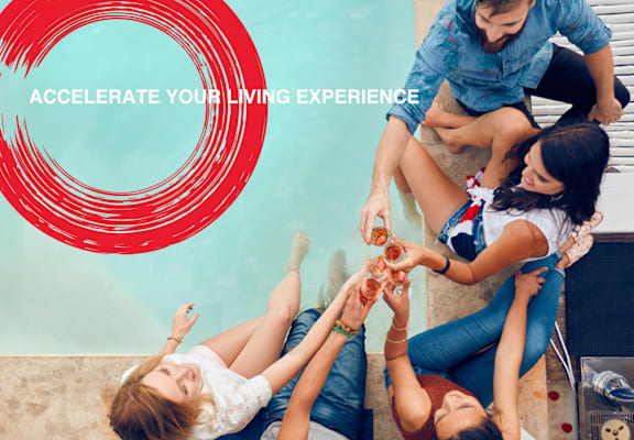 a group of people sitting on the floor with drinks in their hands at Icon One, Florida, 32114