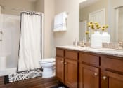 Thumbnail 9 of 9 - Lake Orion Michigan Apartment Rentals Redwood Lake Orion Bathroom with Granite Counters