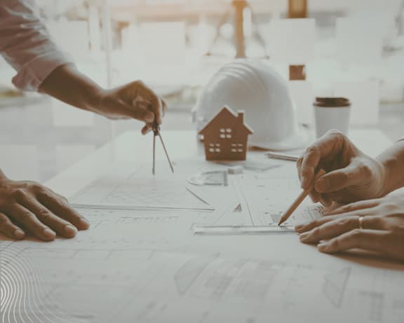 A team of architects or engineers are working on a project at Masselin Park West, California, 90036
