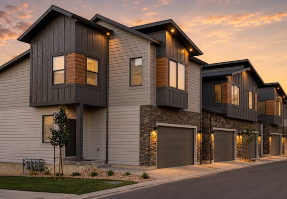 A modern house with a garage is shown in the image.