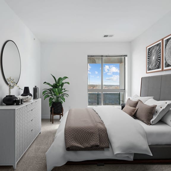a bedroom with a large bed and a window at Fort Totten Square, Washington, Washington DC