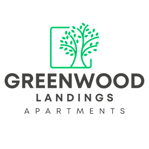 A logo for Greenwood Landings Apartments featuring a tree in a square.