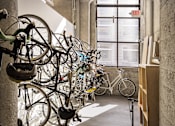 Thumbnail 25 of 25 - A bike rack with many bicycles parked.