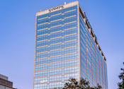 Thumbnail 12 of 19 - A Sammons building with a clear blue sky in the background.