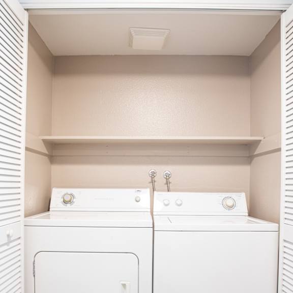A white double sink bathroom with a white cabinet.at OSM Properties Homes & Apartments, California, 95926