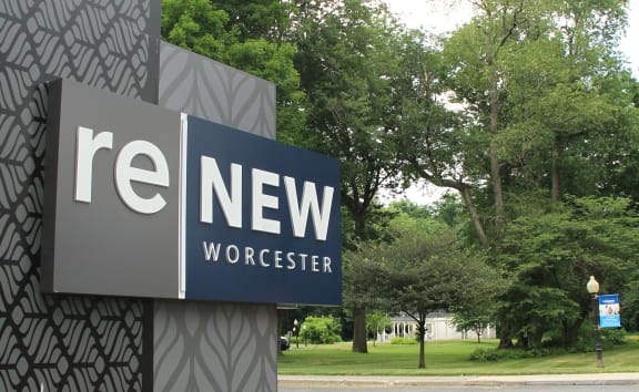 a large building in the middle of a grassy field  at Renew Worcester, Worcester, MA