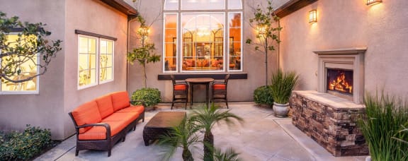 Posh Lounge Area With Fireplace In Clubhouse at Sonoma at Mapleton, California