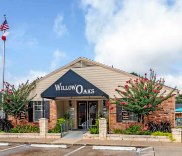 our apartments offer a parking lot in front of the building  at Willow Oaks, Bryan, TX