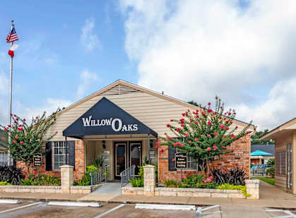 our apartments offer a parking lot in front of the building  at Willow Oaks, Bryan, TX