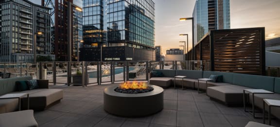 a fire pit on the roof of a building