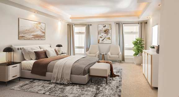 A bedroom with a large bed and a chair.