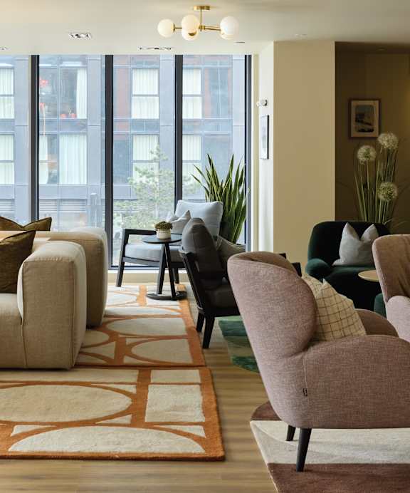 a living room with couches and a coffee table