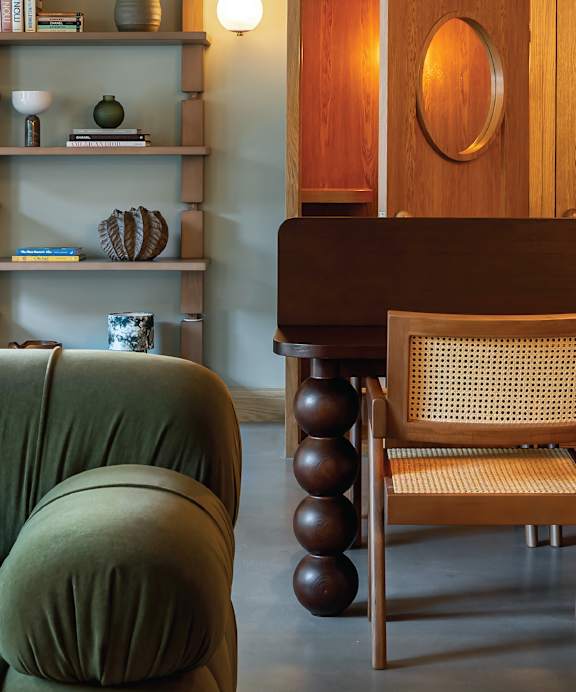 a living room with couches and a coffee table