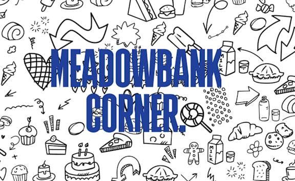 A blue sign with the words "Meadowbank Corner" written in white.
