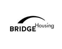 A black and white logo for Bridge Housing.