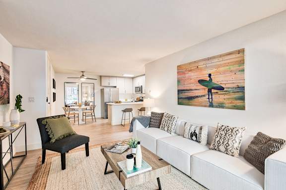 a living room with a couch and a coffee table at The Meadows Apartments, Culver City , CA 90230