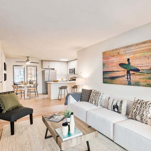 a living room with a couch and a coffee table at The Meadows Apartments, Culver City , CA 90230