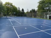 Thumbnail 11 of 26 - Sport court with tennis and foursquare