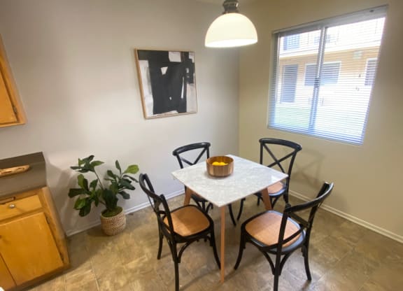a view of a bathroom with a shower and a lighting fixture at Bowles Apts, Azusa, CA