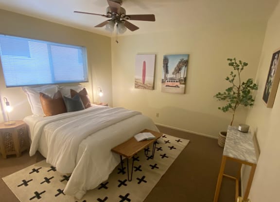 an overhead view of a bedroom with a bed and a ceiling fan at Bowles Apts, Azusa California