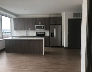 Living Area With Kitchen at The Grand, Kansas City, MO, 64106