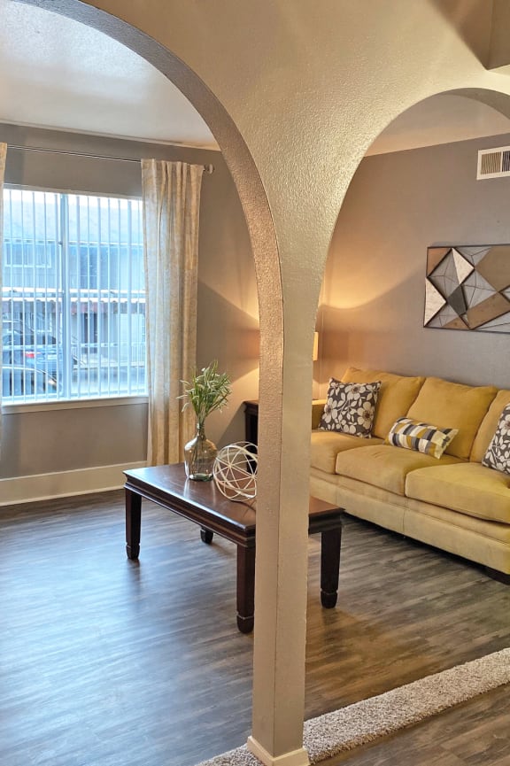 a living room with a couch and a coffee table
