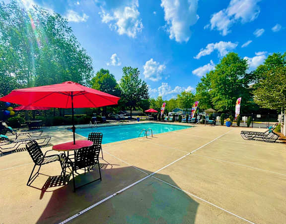 our swimming pool is open to the community with chairs and umbrellas at Hidden Creek, Morrow, Georgia 30260