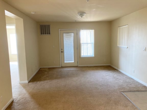Image of door, windows, and what looks like an entrance way