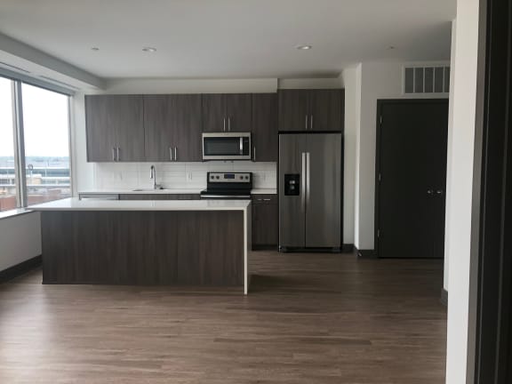 Living Area With Kitchen at The Grand, Kansas City, MO, 64106