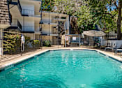 Thumbnail 13 of 17 - Swimming Pool surrounded by a gate and small seating area