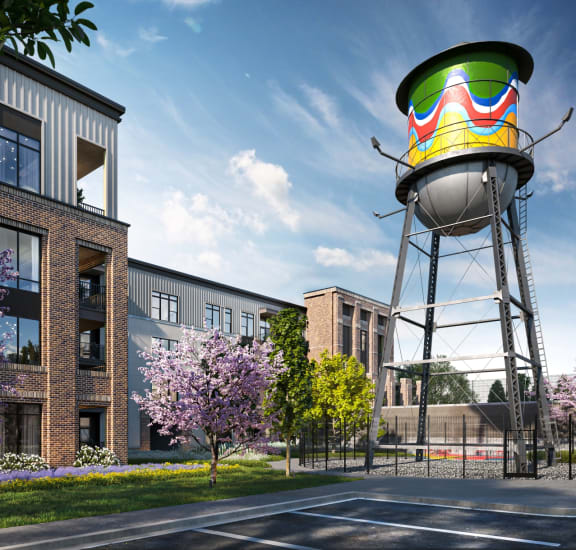 an artist rendering of a water tower in front of a building