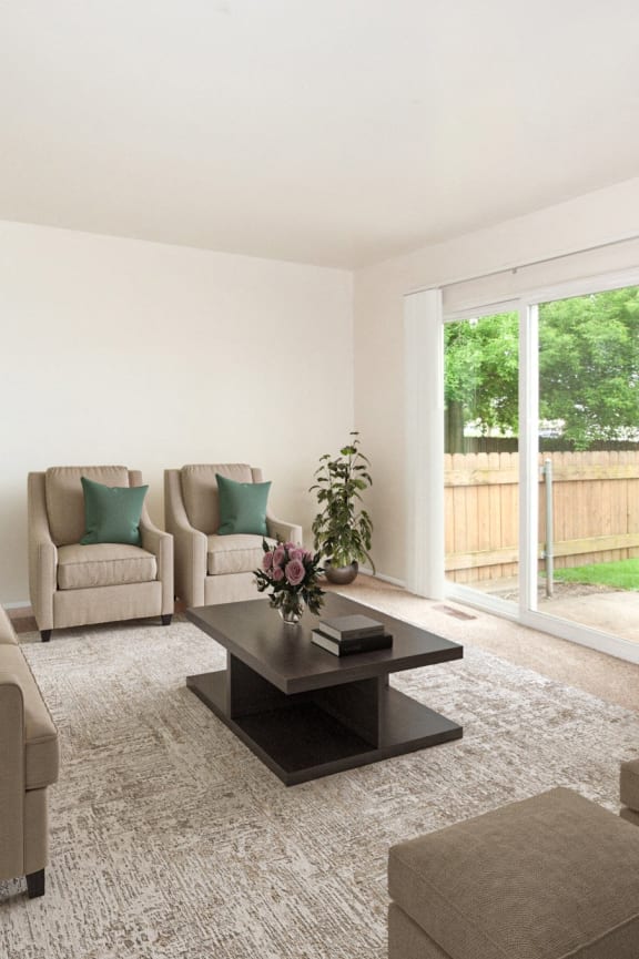 a living room with couches and chairs and a coffee table