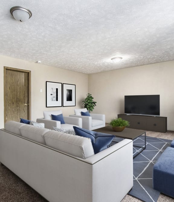 a living room with a couch and tv